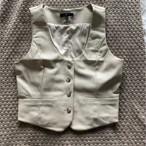 NWOT ivory faux leather vest. Size small
